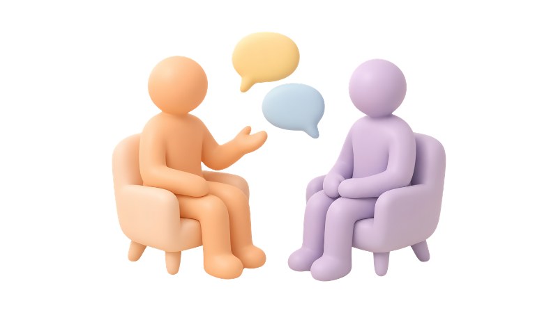 Due persone sedute che si scambiano un feedback